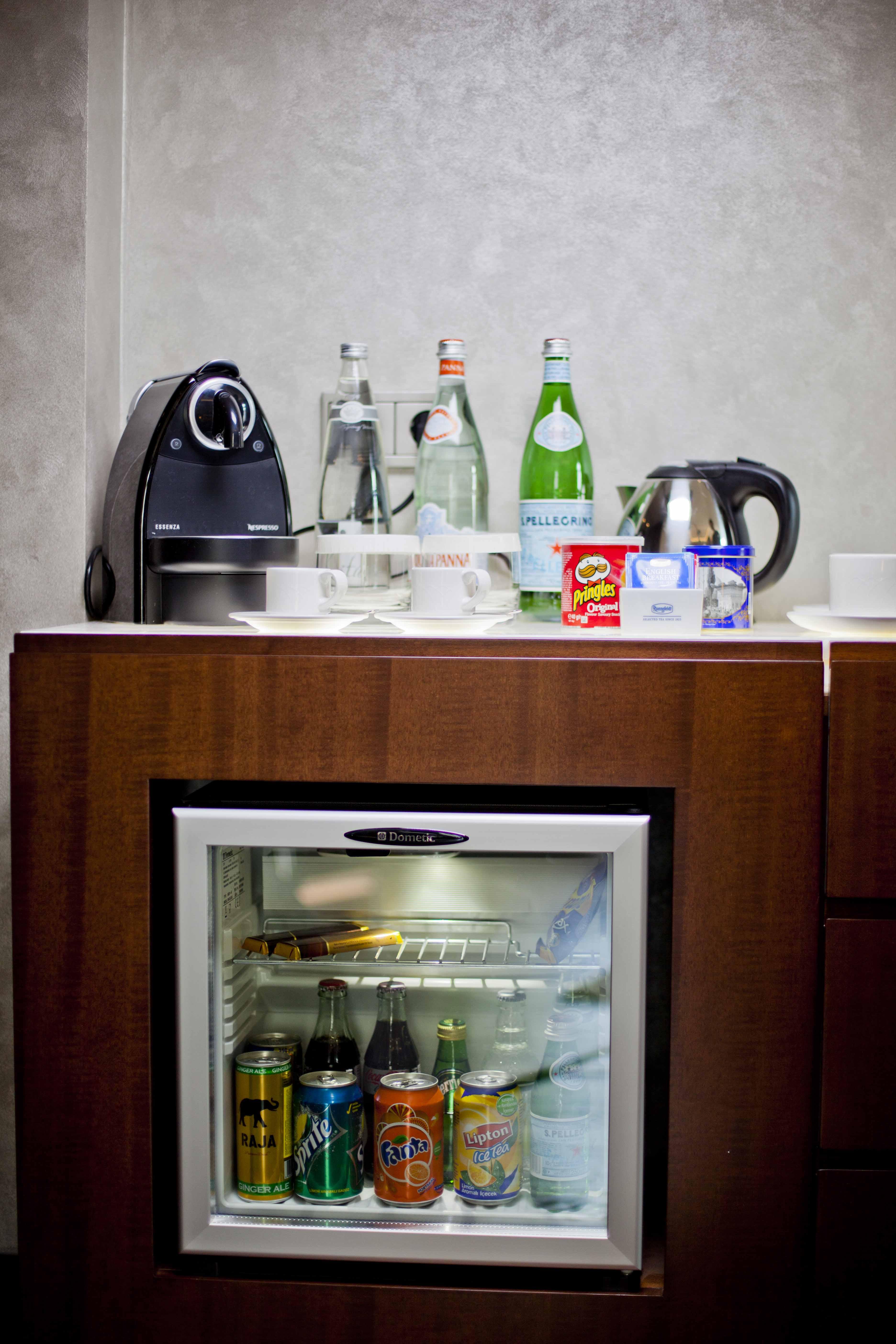 Lasagrada Hotel Istanbul Exterior photo A small refrigerator in a hotel room