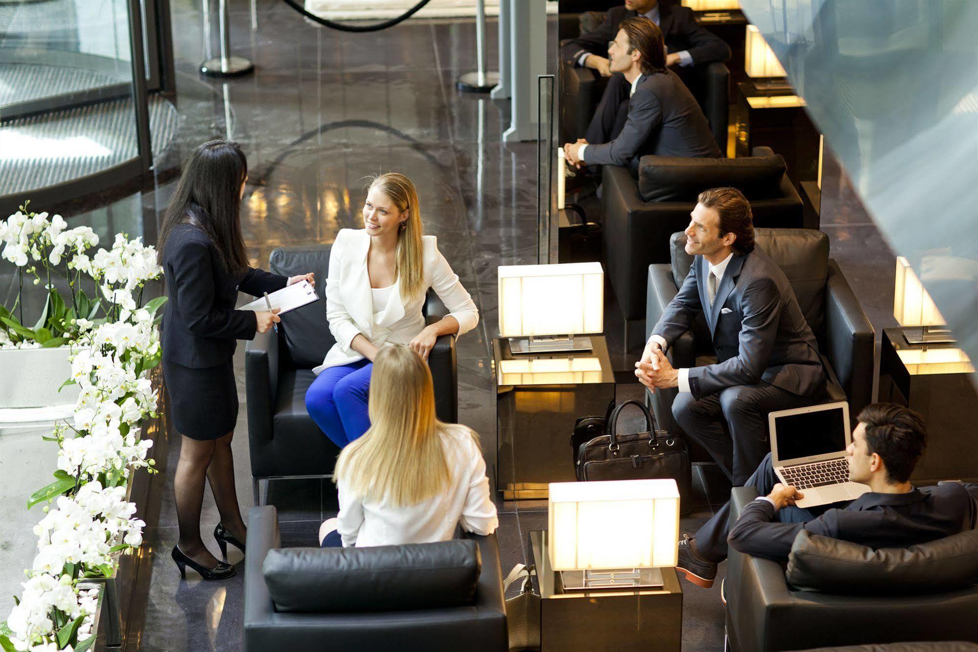 Lasagrada Hotel Istanbul Exterior photo Businesspeople in a lounge at Moscow's Domodedovo Airport